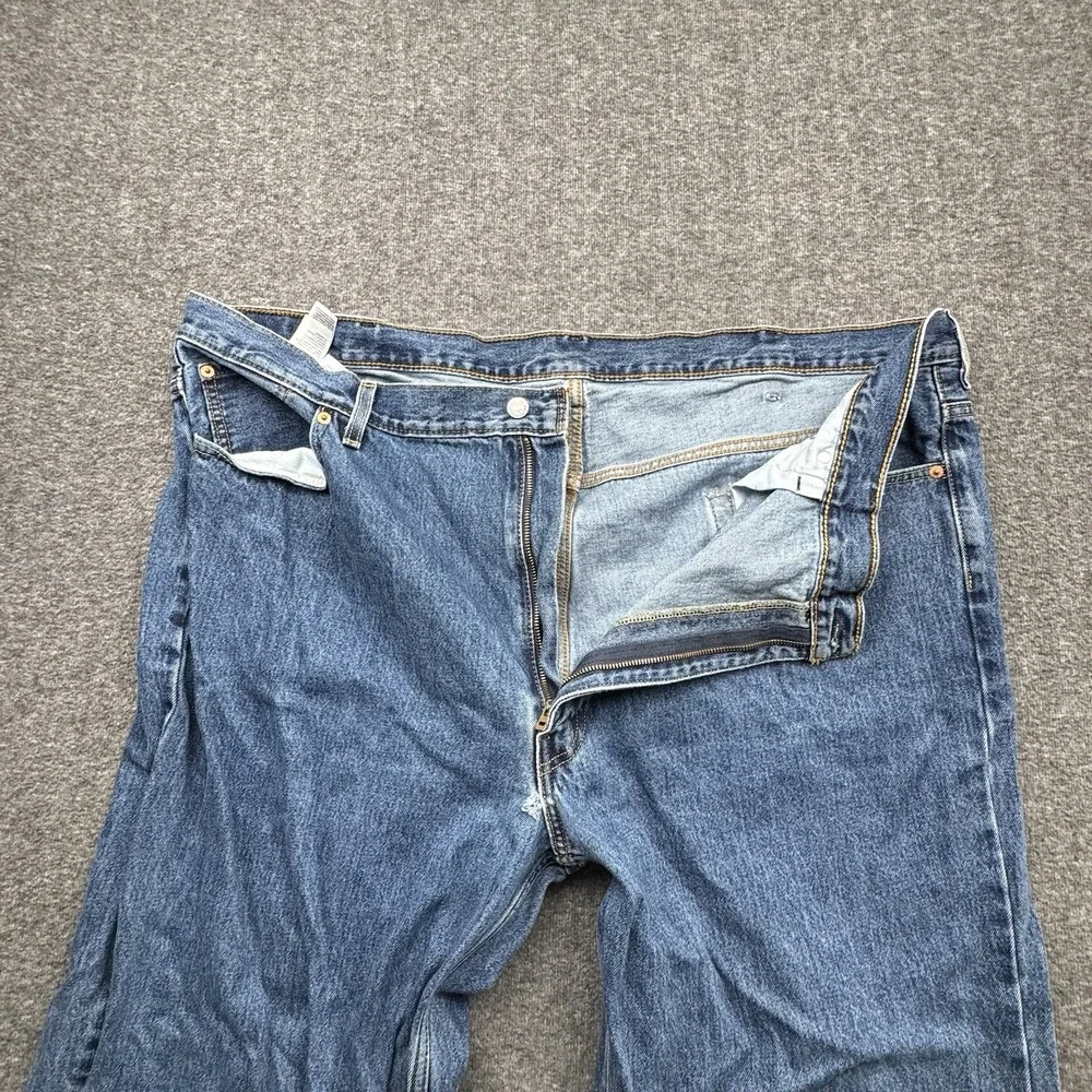 Levis 550 Relaxed Fit Mens Blue Jeans‎ Mens Size 50x32 Fits 50x31 Denim *Hole*